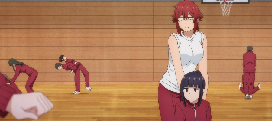 a screencap from "Tomo-chan is a Girl," showing Tomo and Misuzu in PE gear glaring at someone offscreen.